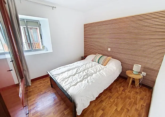 Familiar La Riuca En *